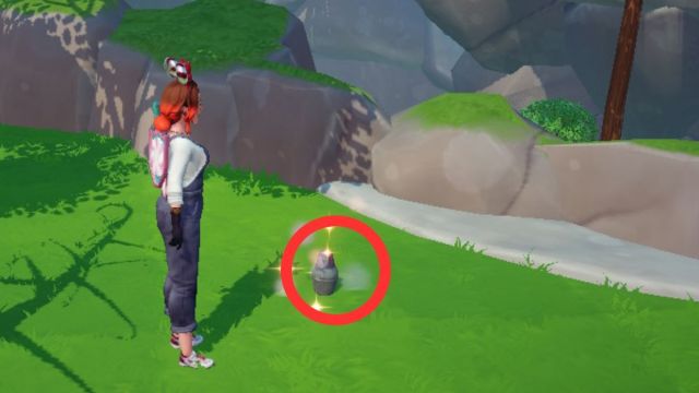 Muñecas Matryoshka encontradas en el entorno de la plaza de Disney Dreamlight Valley con un círculo rojo alrededor.