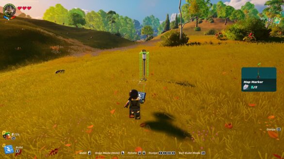 LEGO character on green grass setting a pole waypoint.