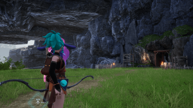 Personaje parado frente a una cueva minera en Palworld.