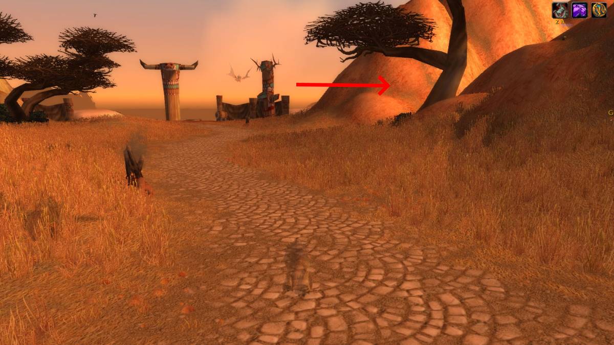 Una imagen de la entrada a RFK con una flecha apuntando hacia ella en WoW Classic.