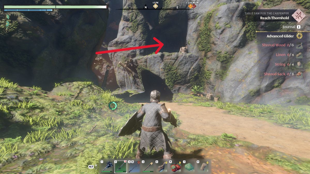 Entrada a la cueva cubierta para la misión del huso manual del cazador marcada.