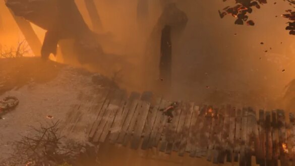 Last Epoch character running in fire.