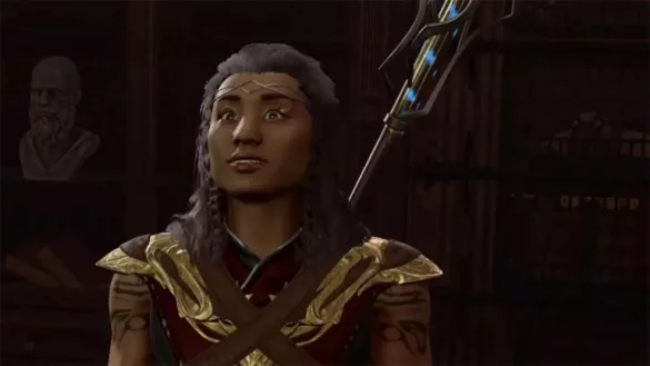 dark skinned female mage with a staff on her back in baldur