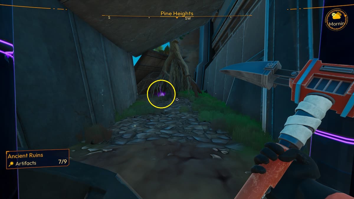 Artefacto en Pine Heights en Lightyear Frontier, escondido bajo la raíz de un árbol