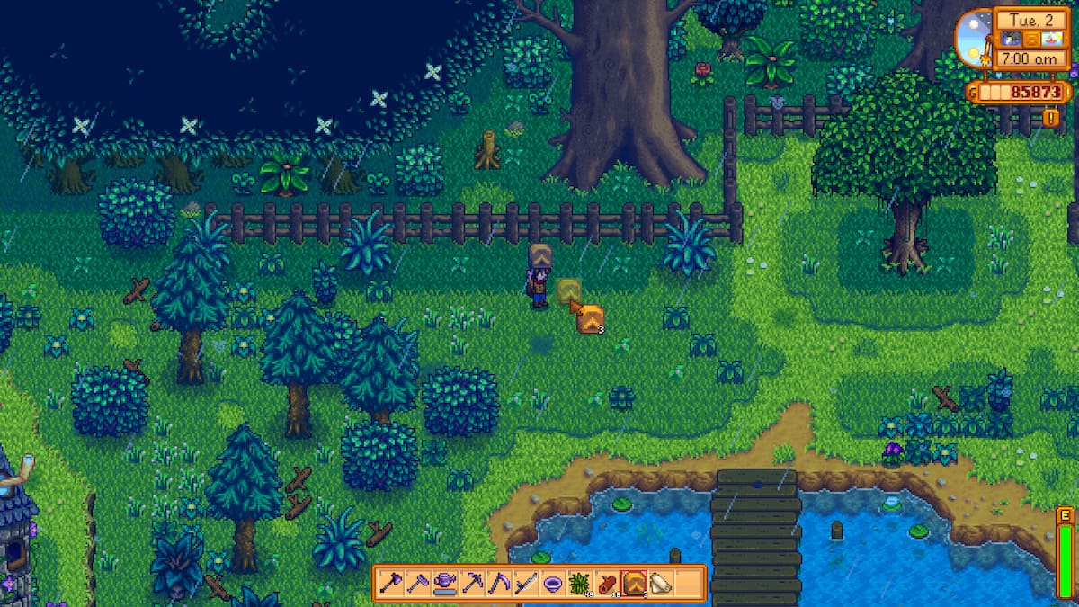 Jugador sosteniendo kits de tienda de campaña, cursor sobre el lugar para colocarlo