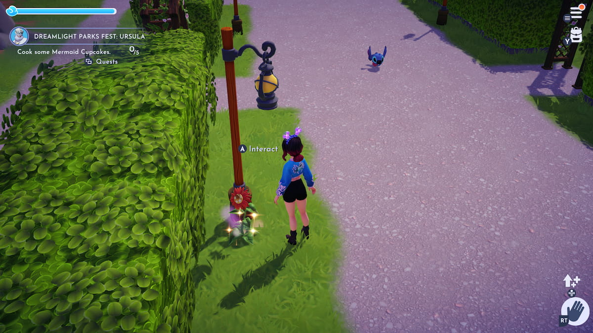 Botón de flor de Disney Dreamlight Valley que crece en una pradera tranquila para Dreamlight Parks Fest