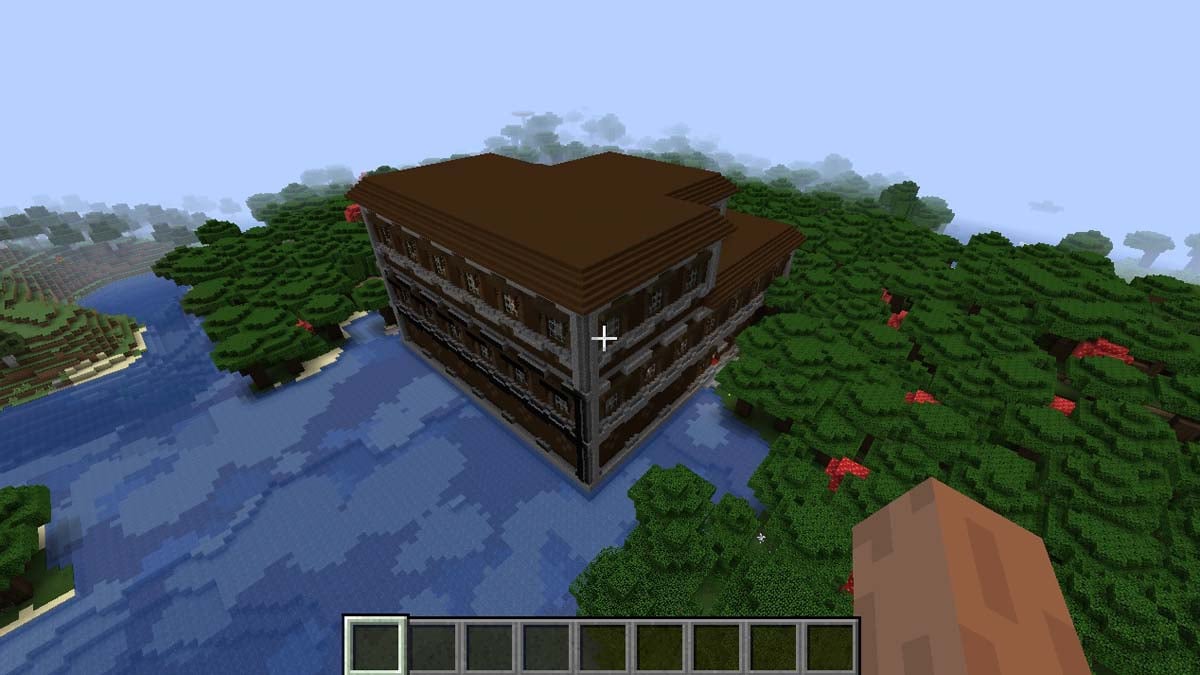 Mansión en el bosque junto al río en Minecraft
