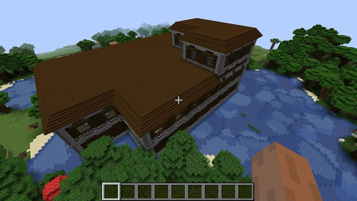 Mansión en el bosque junto al río en Minecraft
