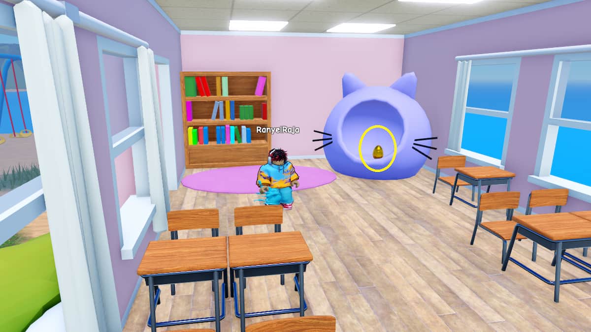 बिल्ली के बच्चे के खेल में एक अंडा