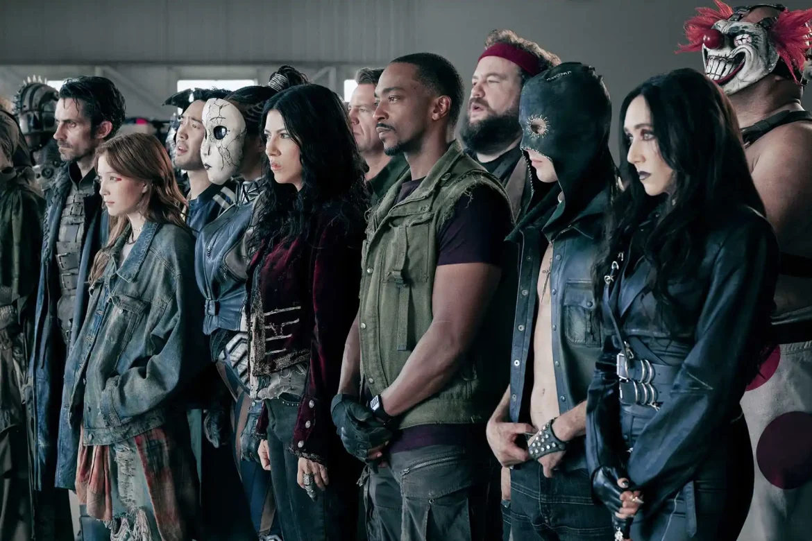 (l-r) Richard De Klerk, Saylor Bell Curda, Andre De Kim, Tiana Okoye, Stephanie Beatriz, Johnno Wilson, Anthony Mackie, Mike Mitchell, Tyler Johnston, Patty Guggenheim, Joe Seanoa