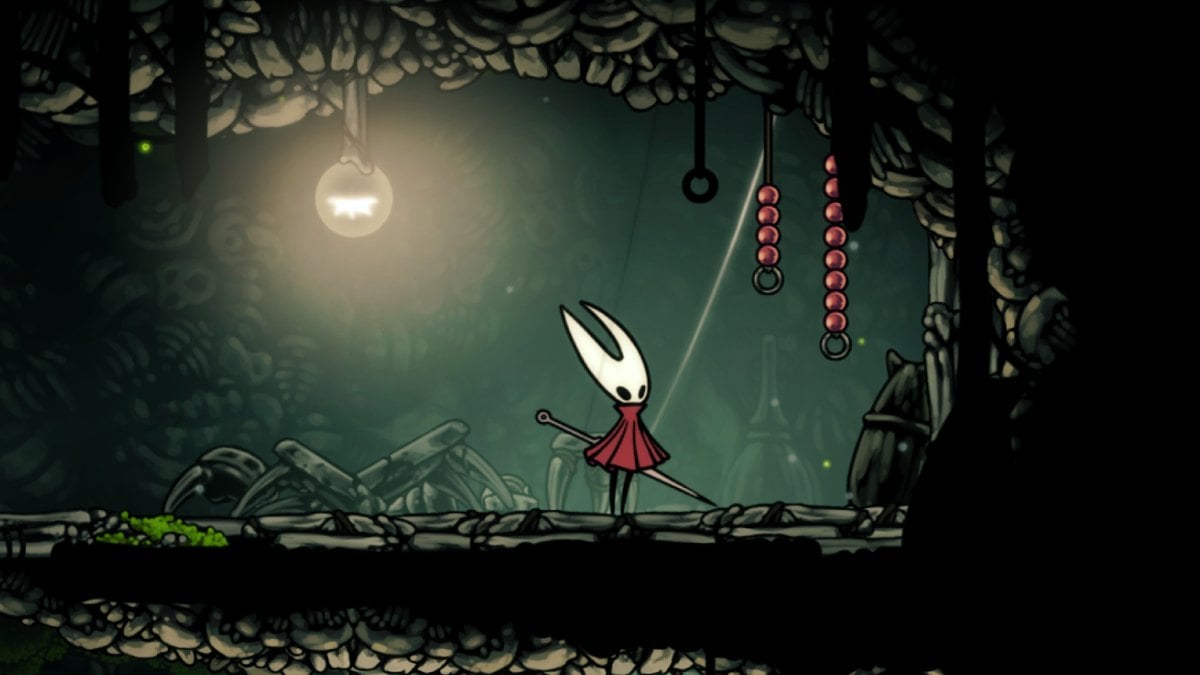 Cadena de rosario de Silksong Hollow Knight colgando de las paredes